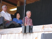 Rosa Lee and Doc Watson listening to Earl Scruggs at MerleFest, 2007